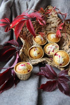 Cupcakes with cherry filling decorated with leaves
