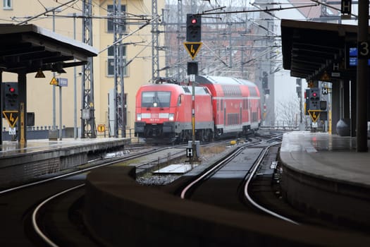 Berlin, Germany 1. April 2018: an Train of the Deutsche Bahn enters the station Friedrichstreet