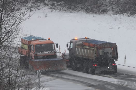 Birkenfeld, Germany February 6, 2018: A Winter service vehicle in use in heavy snow-fall