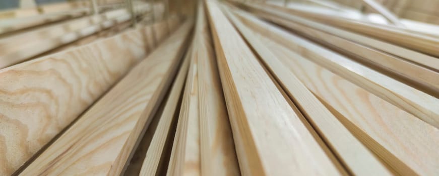Planed strips made of fir tree wood. Long format