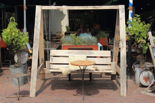 A self-made two-seater wooden hover bench