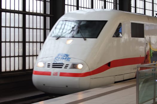 Berlin, Germany 1. April 2018: an ICE of the Deutsche Bahn enters the station Friedrichstreet