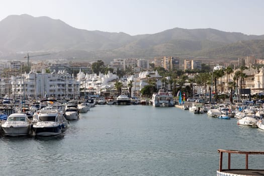 Benalmadena, Spain - September 15, 2023: Boats and yachts moored at Puerto Marina in Benalmadena, Costa del Sol Malaga, Spain. This marina has berths for 1100 boat