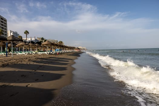 Torremolinos, Spain - September 15, 2023: La Carihuela beach in Torremolinos, Malaga, Costa del Sol, Spain