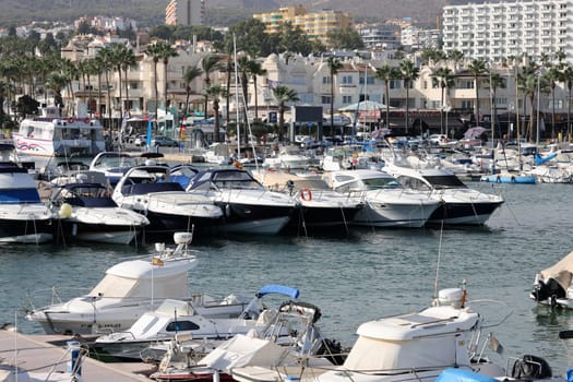 Benalmadena, Spain - September 15, 2023: Boats and yachts moored at Puerto Marina in Benalmadena, Costa del Sol Malaga, Spain. This marina has berths for 1100 boat