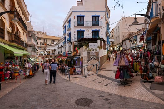 Torremolinos, Spain - September 18, 2023: View of a tourist shopping street inTorremolinos, Costa del Sol, Malaga Province, Spain