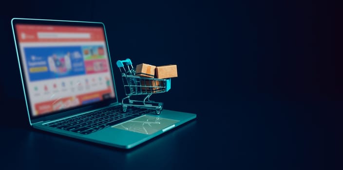 Boxes in a shopping car on a laptop keyboard. Ideas about online shopping, online shopping is a form of electronic commerce that allows consumers to directly buy goods from seller over the internet.
