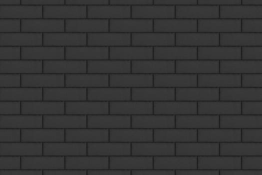 The brick wall is dark gray in color. Texture or background
