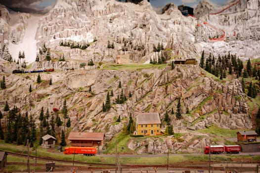 Miniatur Wunderland Hamburg in Germany, Switzerland with the alps and railway, museum with miniature model construction of the world, 12.12.2023