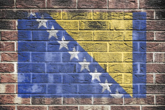 A Bosnia Herzegovina flag on brick wall background