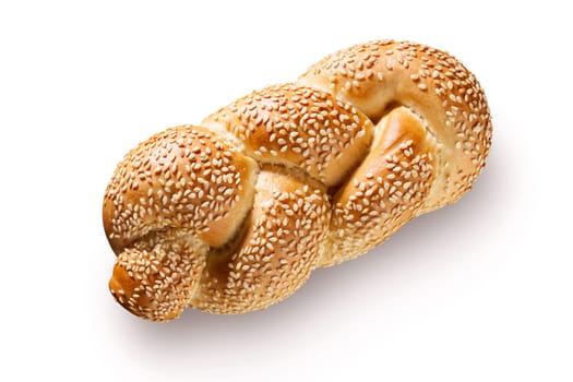 Discover a tempting homemade sesame bun, skillfully braided on a clean white backdrop. This golden delight offers artisanal charm, perfect for gourmet, traditional, and breakfast-themed designs