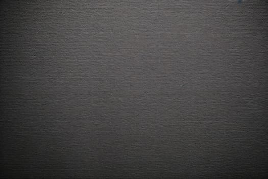 Texture of dark gray pile carpet for floor.