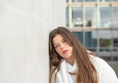 pensive young woman in the city