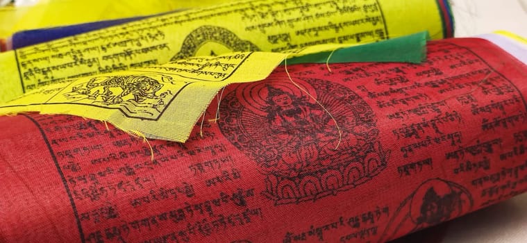Folded tibetan prayer flags. Long format
