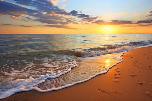 Golden Sunrise over Gentle Waves on Sandy Beach. High quality photo