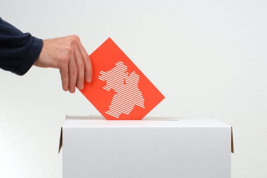Election in german federal state Niedersachsen - Hand and ballot box