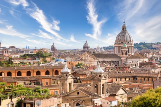 Rome, Italy. Urban landscape, blue sky with clouds, church exterior architecture.