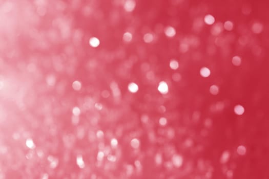 Red background with shining points of light