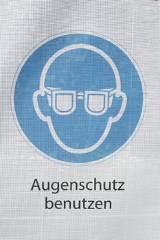 Warning sign Use eye protection, Germany