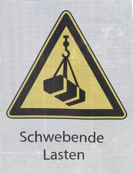 Yellow warning sign Suspended loads, Germany