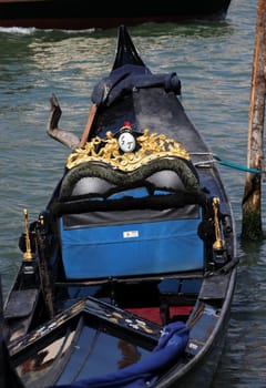 Venice, Italy - September 5, 2022: Venice - Rich decorations of the deck of a venetian gondola