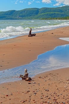 Driftwood on a Sandy Remote Shore on Agawa Bay in Lake Superior Provincial Park in Ontario
