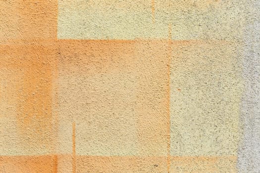 pattern of harmonic yellow textured house wall