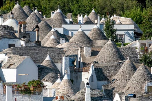 scenic historic stone trullis in Alberobello, Italy