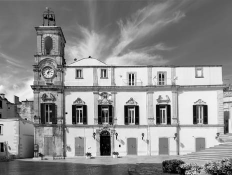 old university palace with clock tower at piazza plebiscito in Martina Franca, Italy