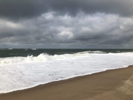 scenic autumn sandy beach with waves and dunes in Sylt, Germany