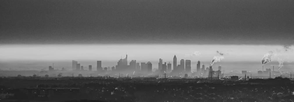 sunrise of skyline in Frankfurt, Germany with dark clouds