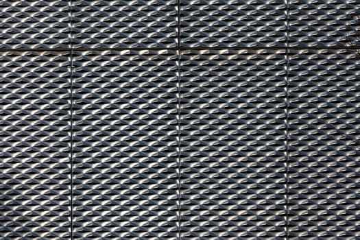 metal background of harmonic pattern of grid