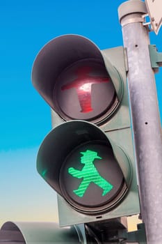 smart green man at a pedesrtrian traffic light in Berlin called Ampelmann in german