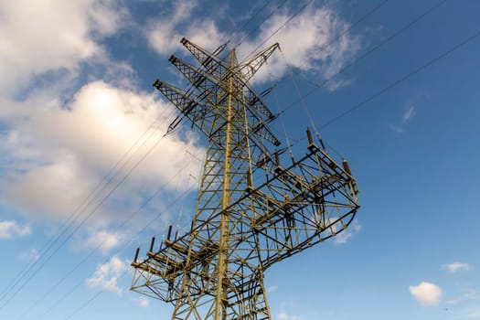 view of electric pylon under clear blue sky