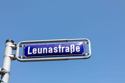 street name Leunastrasse - engl: Leuna street - in Frankfurt industry area under blue sky