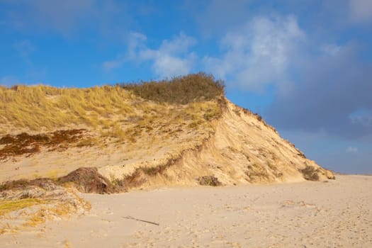 sea landscape with huge waves and empty beach at Hoernum in Sylt, Germany