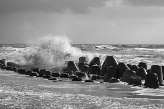 wind breaker at the coast in Sylt in bad weather storm, Hoernum