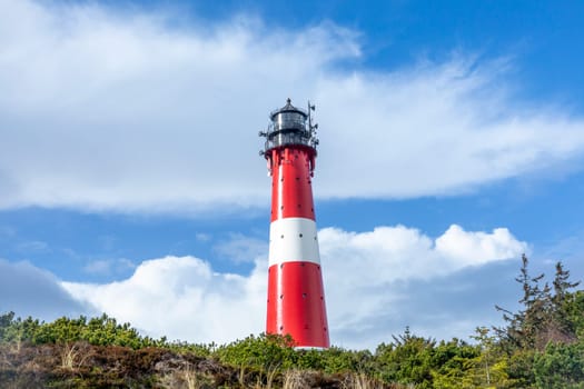 lighthouse of Hoernum on Sylt island, Germany. Landmark, tourist attraction and guiding light for navigation on the North Sea.