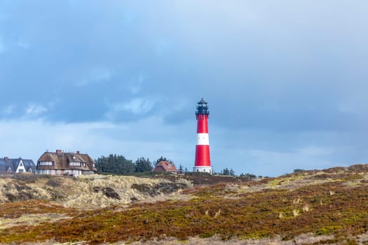 lighthouse of Hoernum on Sylt island, Germany. Landmark, tourist attraction and guiding light for navigation on the North Sea.