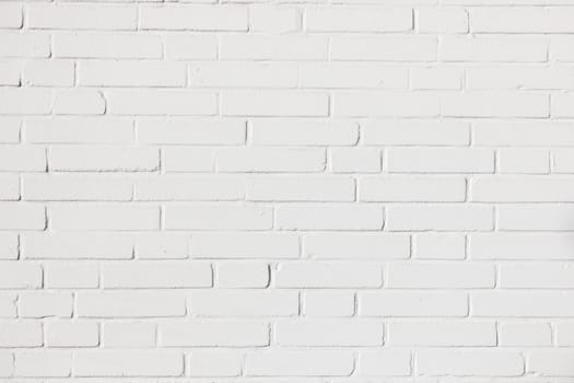 harmonic pattern of white painted brick wall