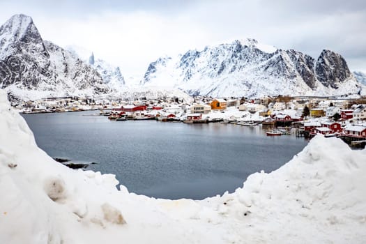scenic landscape photography. Cloudy winter view of Nusfjord town, Norway, Europe. Bright morning scene of Lofoten Islands. Norwegian seascape.