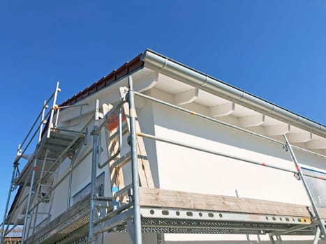 New construction site with finished base plaster