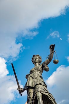 statue of Lady Justice at the Roemer in Frankfurt, a symbol for law and justice