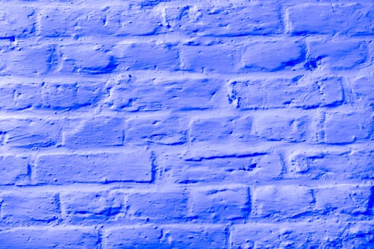 harmonic pattern of blue painted brick wall