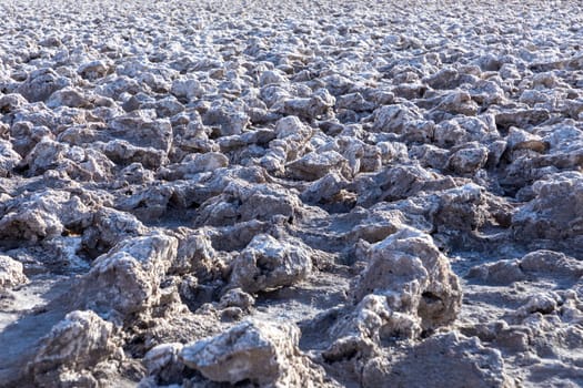 devils golf course, a dry salt lake with crusty saltern nformations in the Death valley, USA