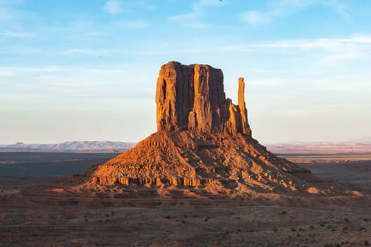 scenic view to monument valley with camel butte and blue sky, USA