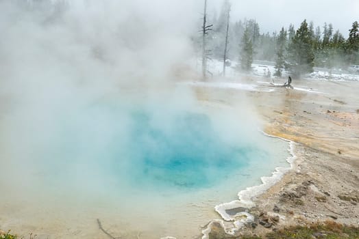 foggy landscape at hot springs in Yellowstone national Park, USA