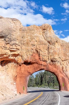 red rock tunnel and arch on the way to the Bryce canyon, USA