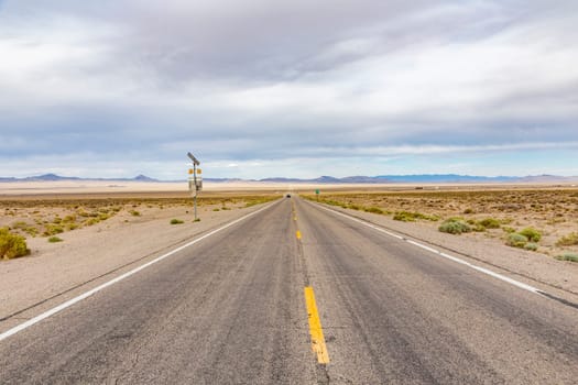 Riding the Route 95 in Nevada on daytime thru the desert, USA