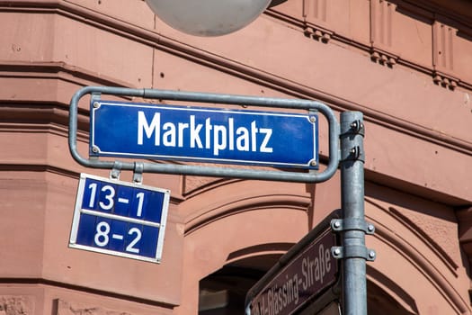 street name sign Marktplatz - engl. market square - in Wiesbaden, Germany